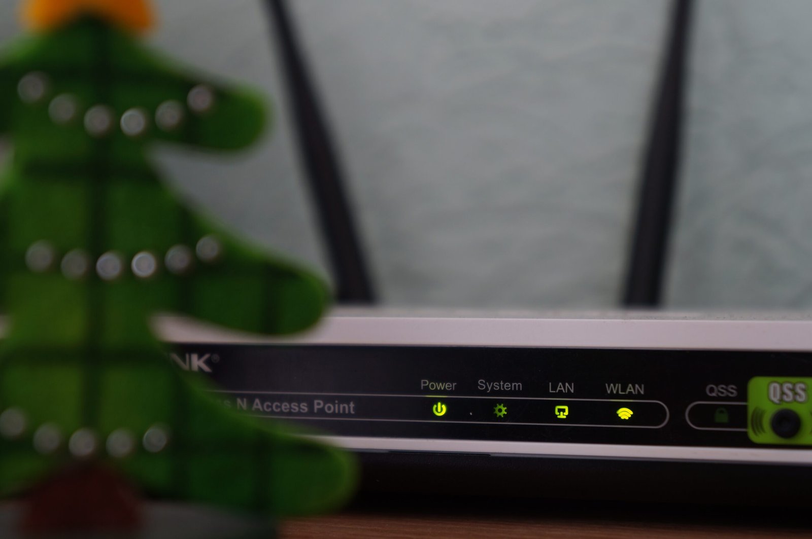 white-and-black-modem-router-with-four-lights-scaled Home