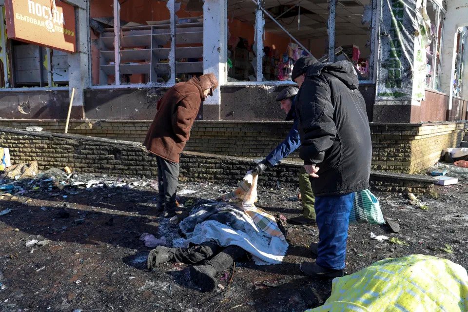 Officials report at least 25 dead in shelling of a market in Russian-occupied Ukraine